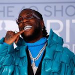 brit awards 2020 burna boy takes winter to the red carpet in blue 1200x800